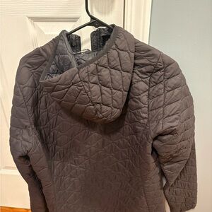 Black quilted light weight jacket.  Smoke-free home.